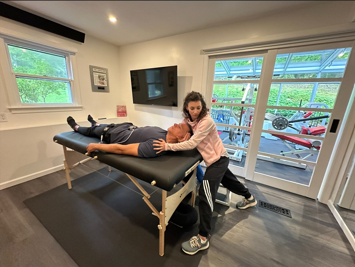 Assisted stretching and recovery support at Pure Conditioning in Stamford CT
