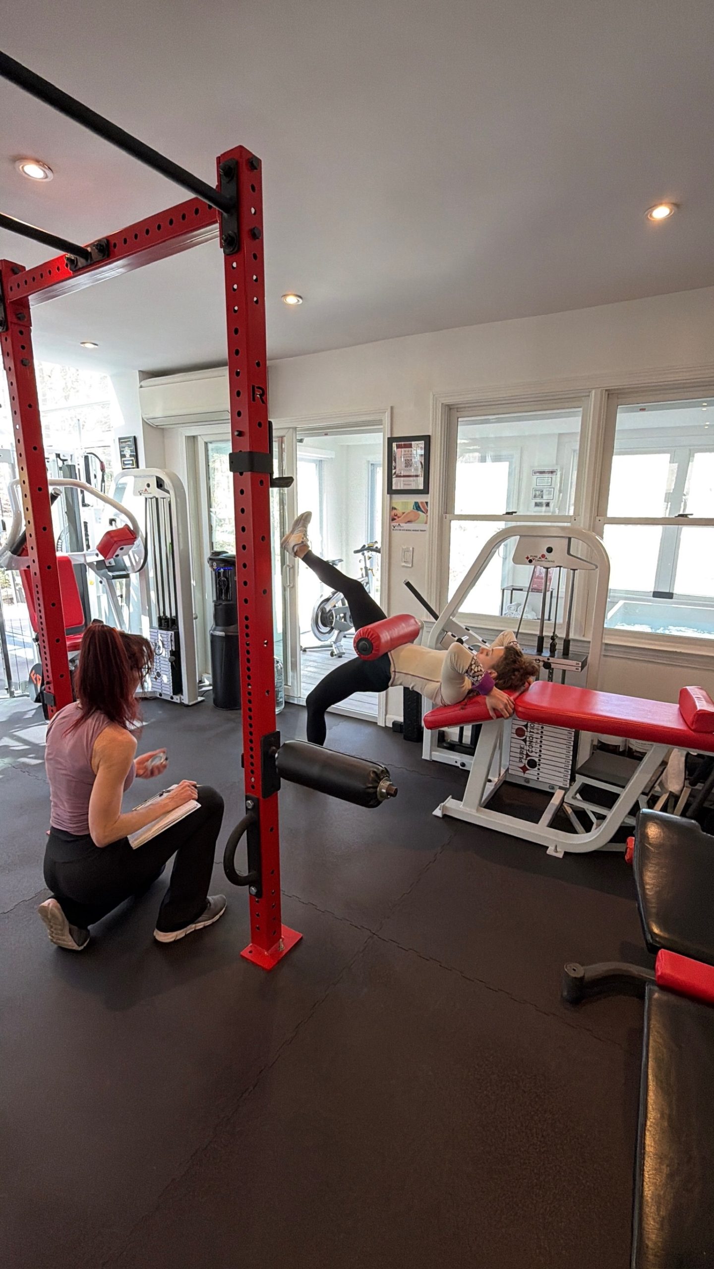 Private personal training session with guided movement at Pure Conditioning at the Solarium in Stamford CT