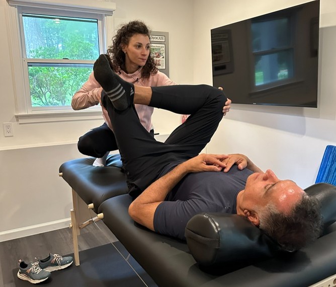 Assisted stretching session for mobility support at Pure Conditioning in Stamford, CT