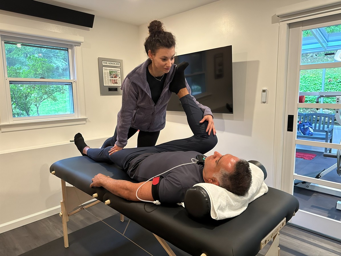 Hands-on assisted stretching focused on mobility and recovery in Stamford, CT
