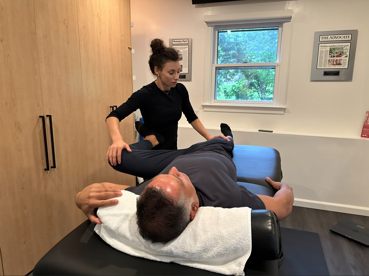 Assisted stretching adjusted around a client’s mobility needs in Stamford, CT
