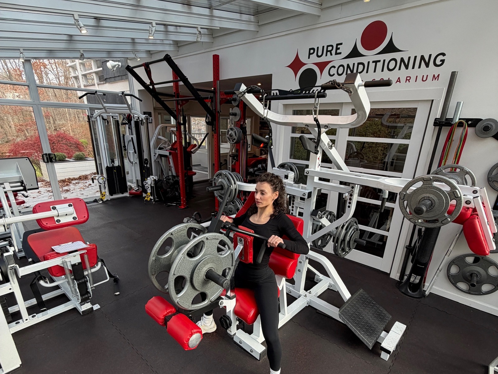 Client training inside Pure Conditioning at the Solarium in Stamford